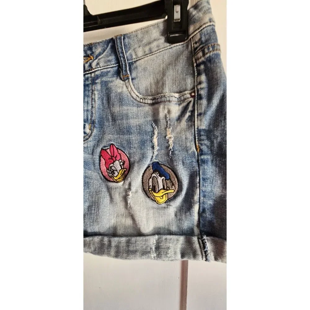 Vtg YiLiHAO size 26 denim shorts Donald and Daisy embroidered distressed‎ cuffed